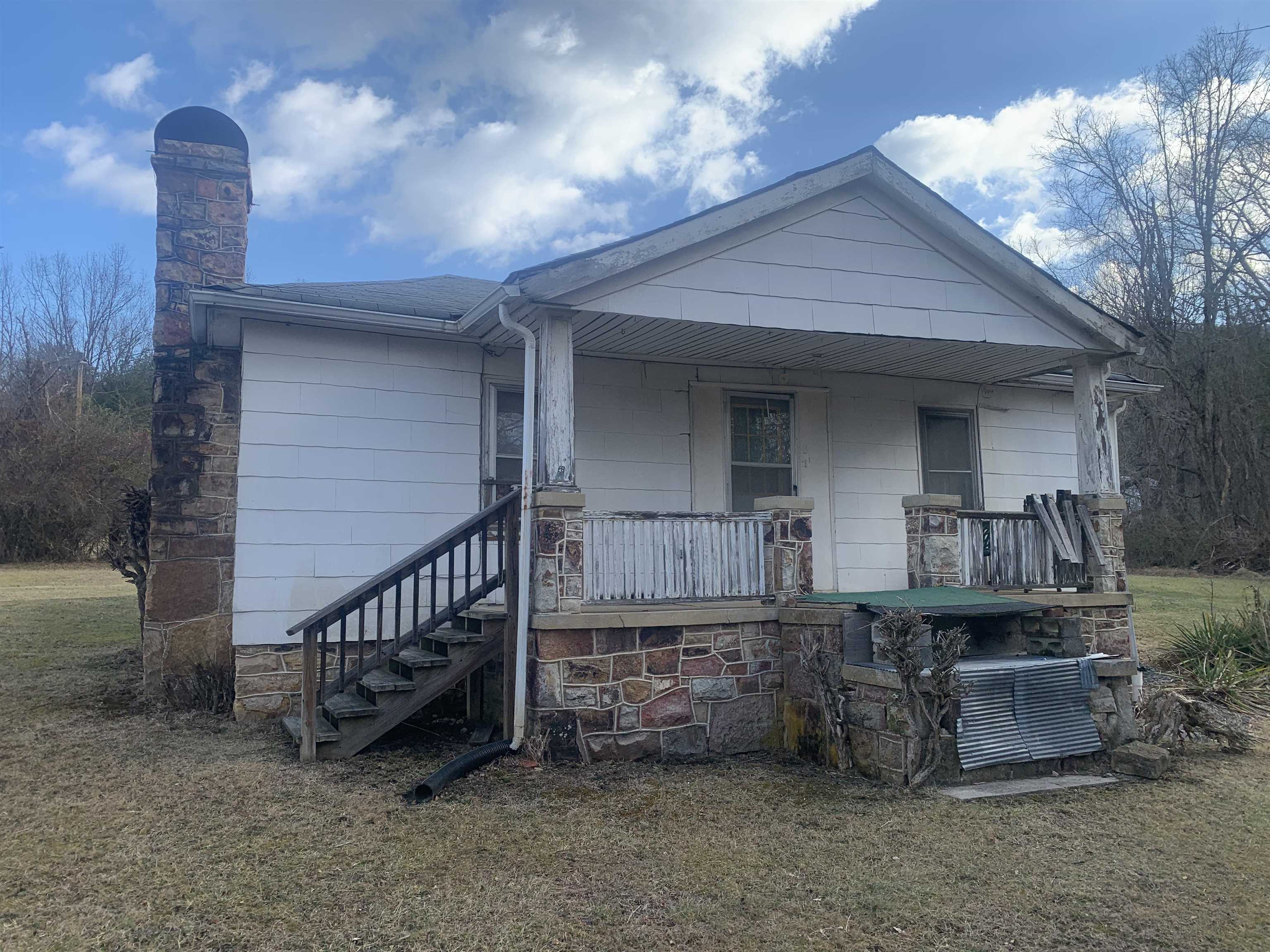 100 Edgewood Lane Warm Springs, VA 24484 - Photo 4 of 4 a view of a small house with roof deck