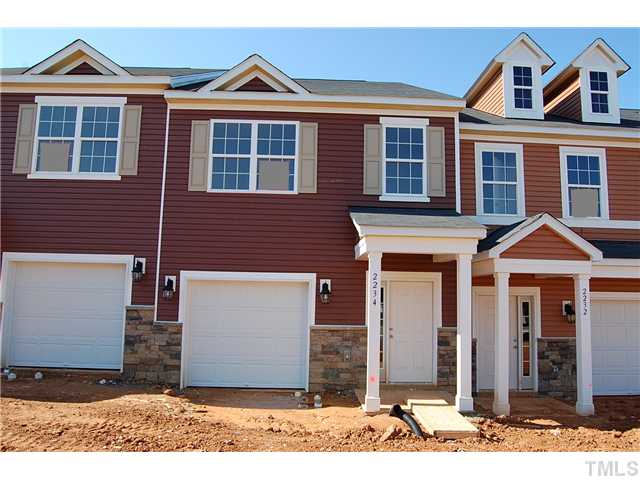 2234 Stoney Spring Drive Raleigh, NC 27610 - Photo 1 of 2 a front view of a house with garden