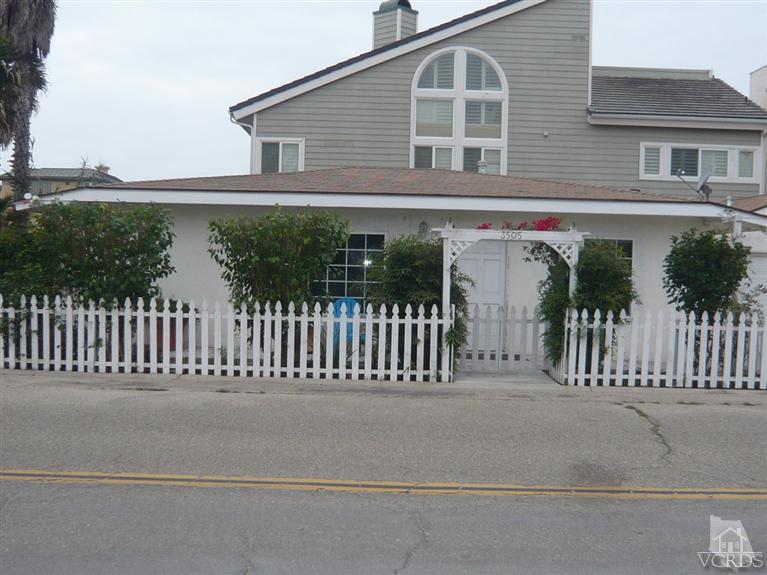 3505 Sunset Lane Oxnard, CA 93035 - Photo 1 of 21 a front view of a house with a porch