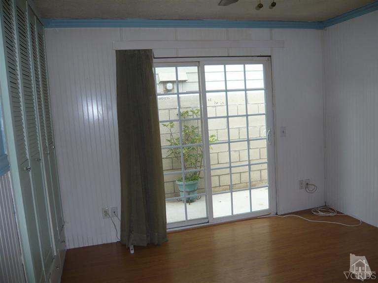 3505 Sunset Lane Oxnard, CA 93035 - Photo 11 of 21 a view of empty room with wooden floor