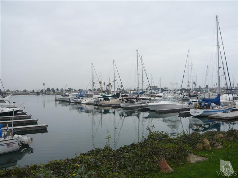 3505 Sunset Lane Oxnard, CA 93035 - Photo 16 of 21 a view of a lake with boats next to a bridge