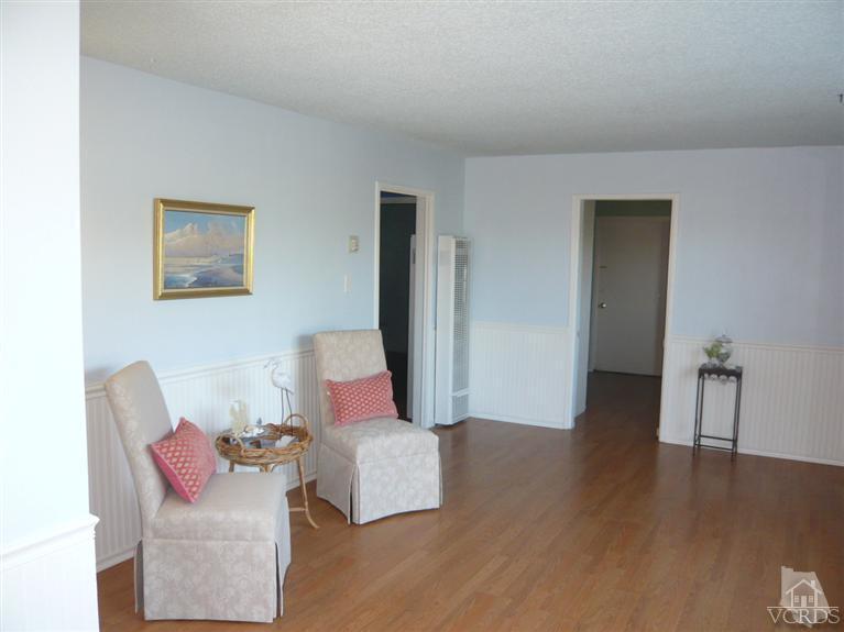 3505 Sunset Lane Oxnard, CA 93035 - Photo 3 of 21 a living room with furniture and a wooden floor