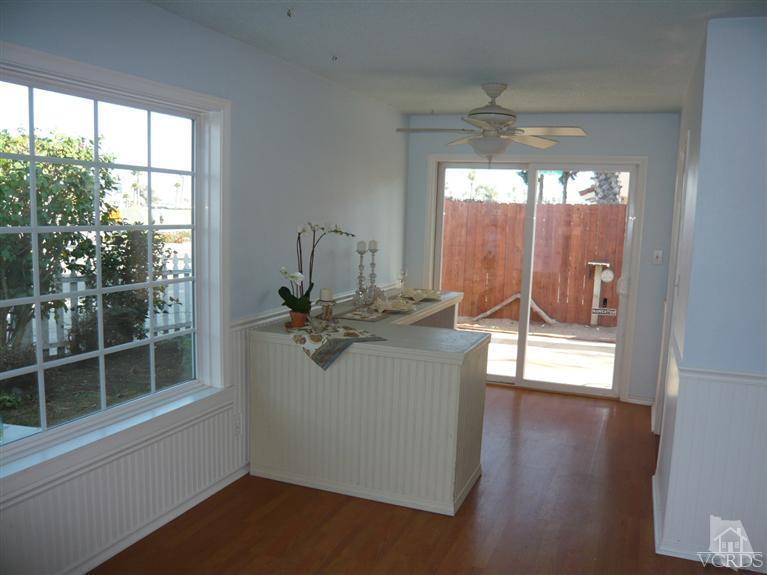 3505 Sunset Lane Oxnard, CA 93035 - Photo 5 of 21 a view of a room with wooden floor and windows