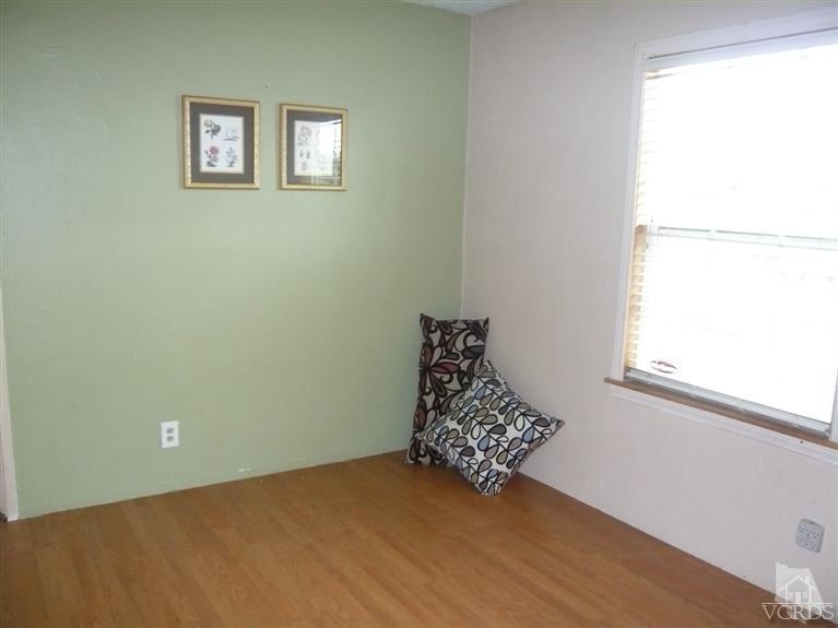 3505 Sunset Lane Oxnard, CA 93035 - Photo 9 of 21 a view of a room with window and brick walls