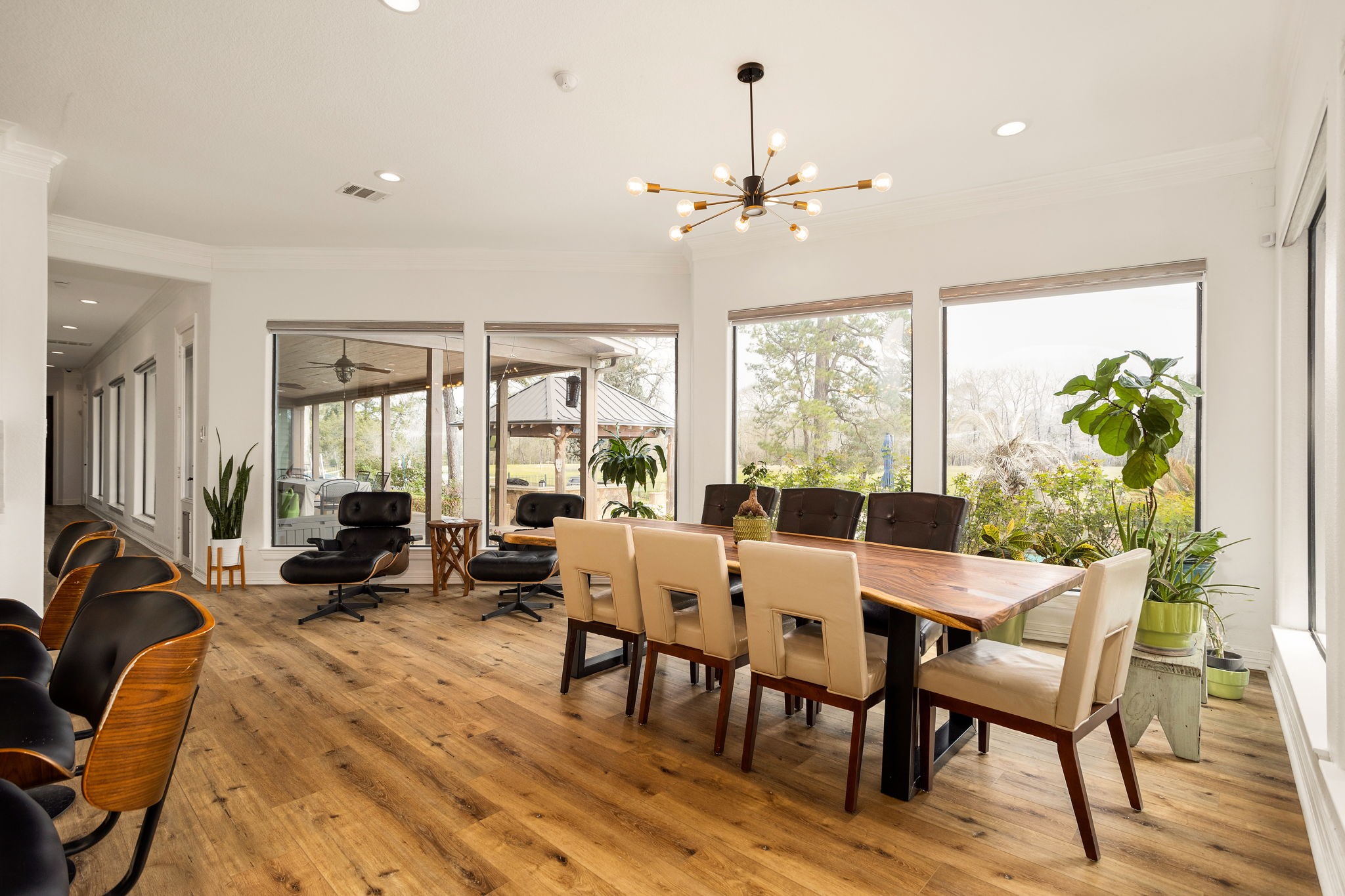 10210 Stidham Road Conroe, TX 77302 - Photo 15 of 39 a view of a dining room with furniture window and outside view