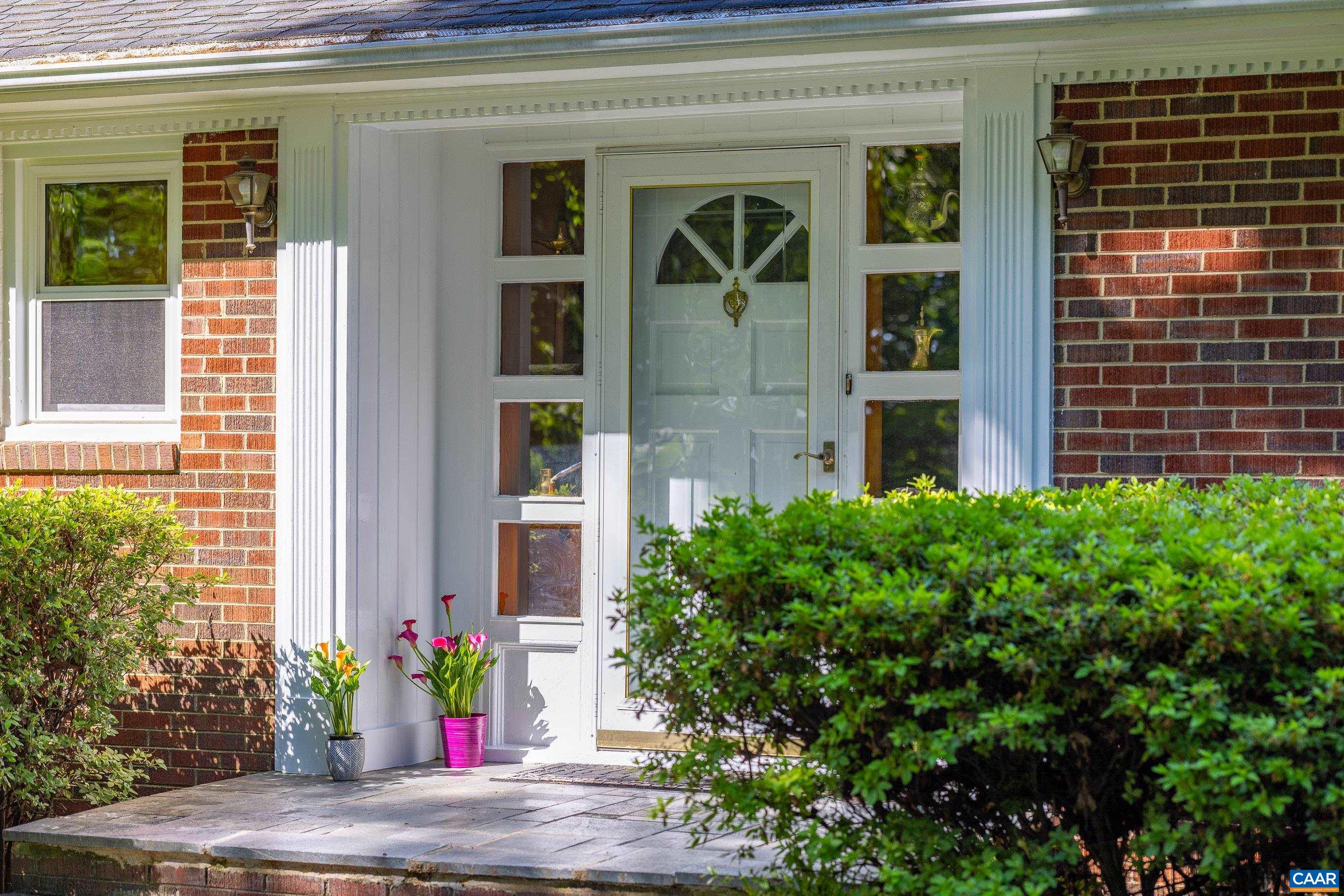 7250 Amicus Road Ruckersville, VA 22968 - Photo 20 of 74 a view of a house with potted plants