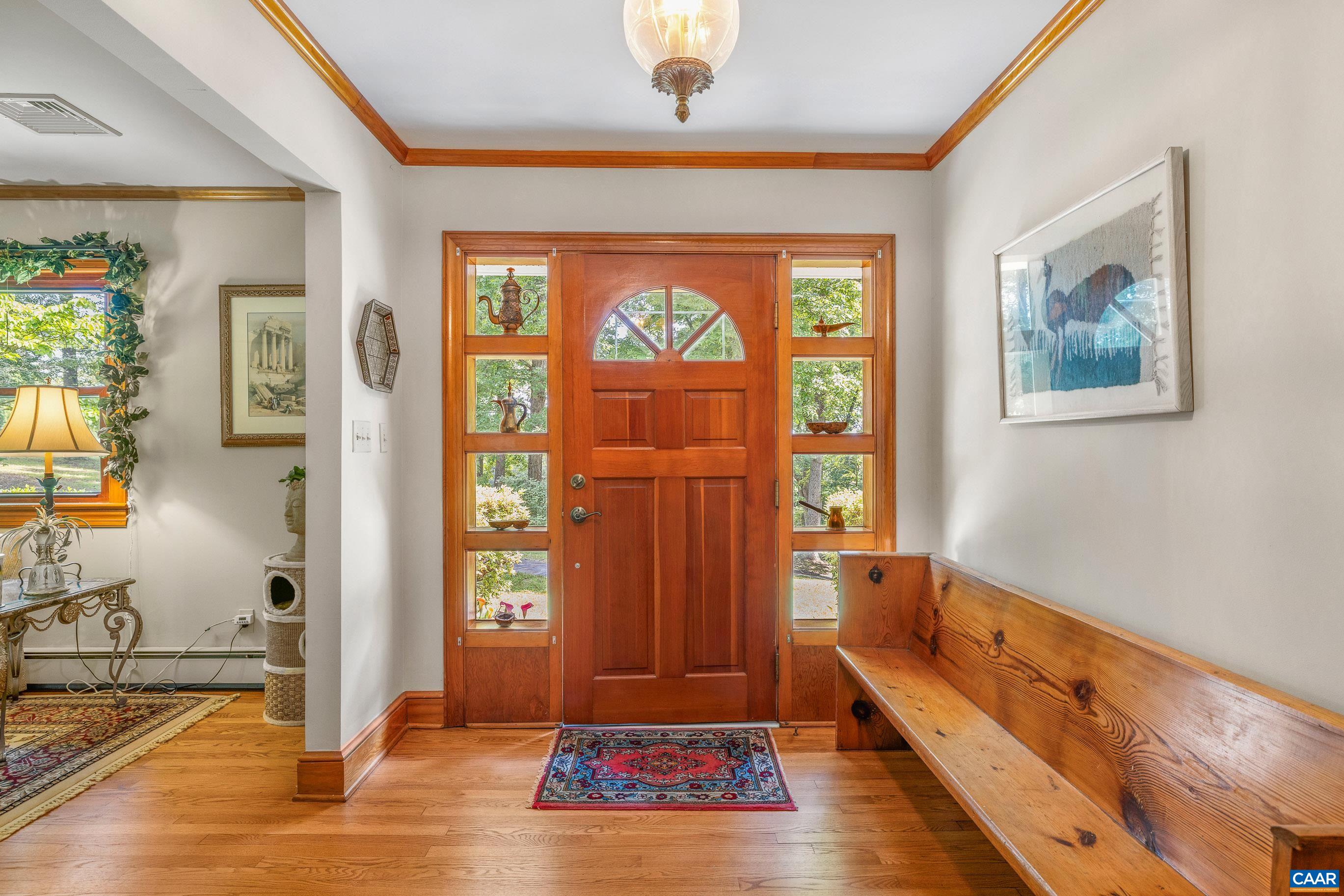 7250 Amicus Road Ruckersville, VA 22968 - Photo 22 of 74 a view of an entryway with wooden floor
