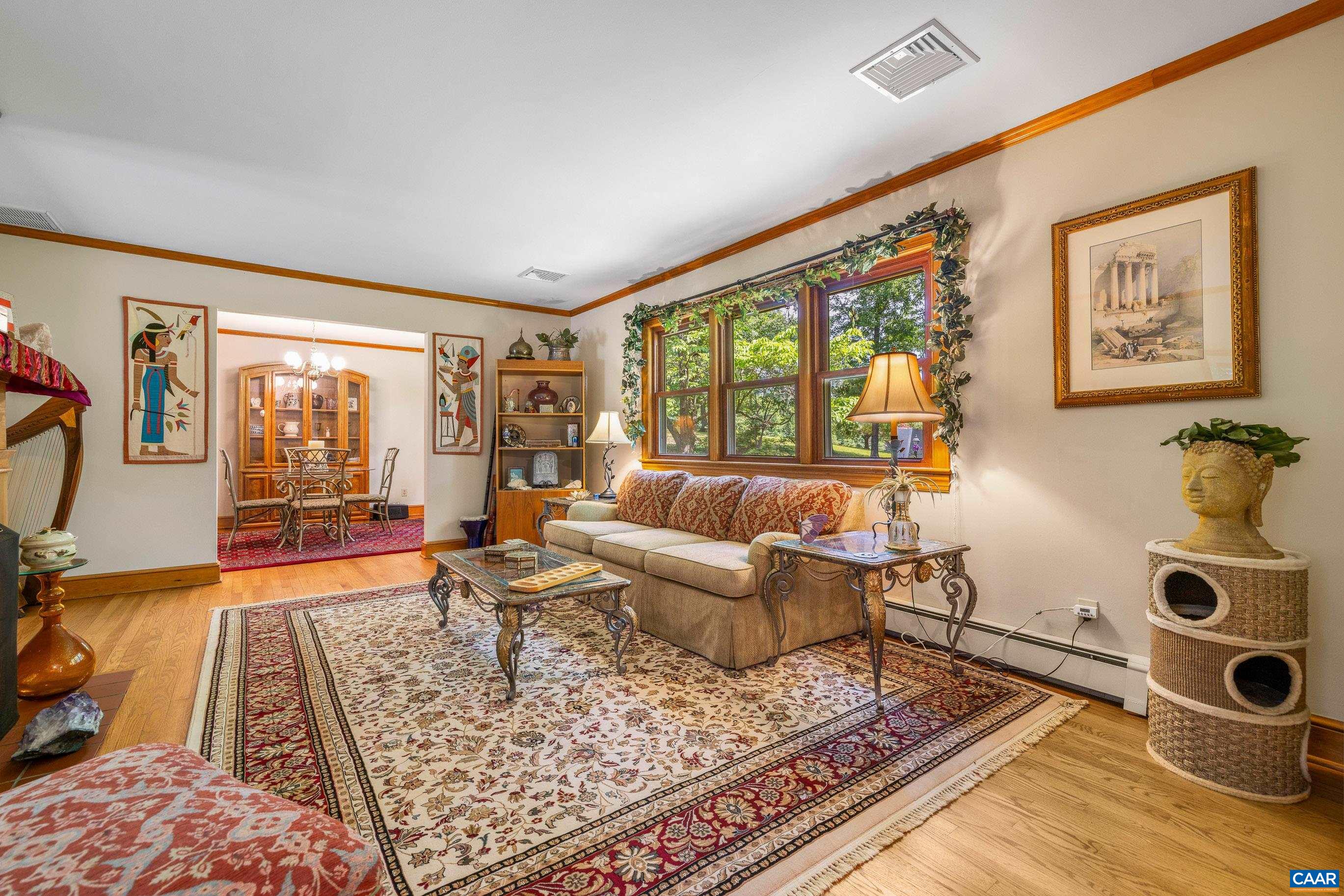7250 Amicus Road Ruckersville, VA 22968 - Photo 25 of 74 a living room with furniture and a window