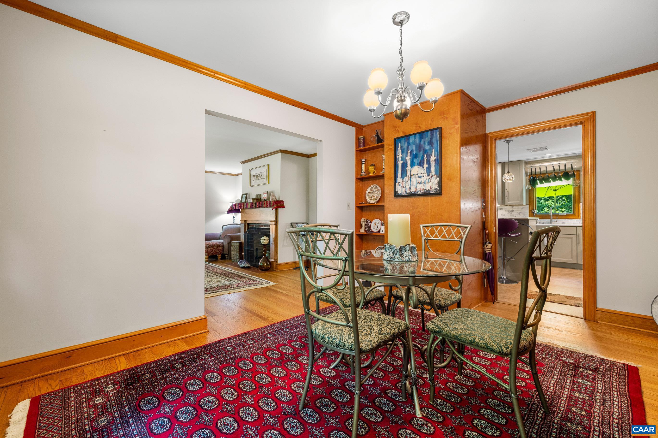 7250 Amicus Road Ruckersville, VA 22968 - Photo 29 of 74 a dining room with furniture and wooden floor
