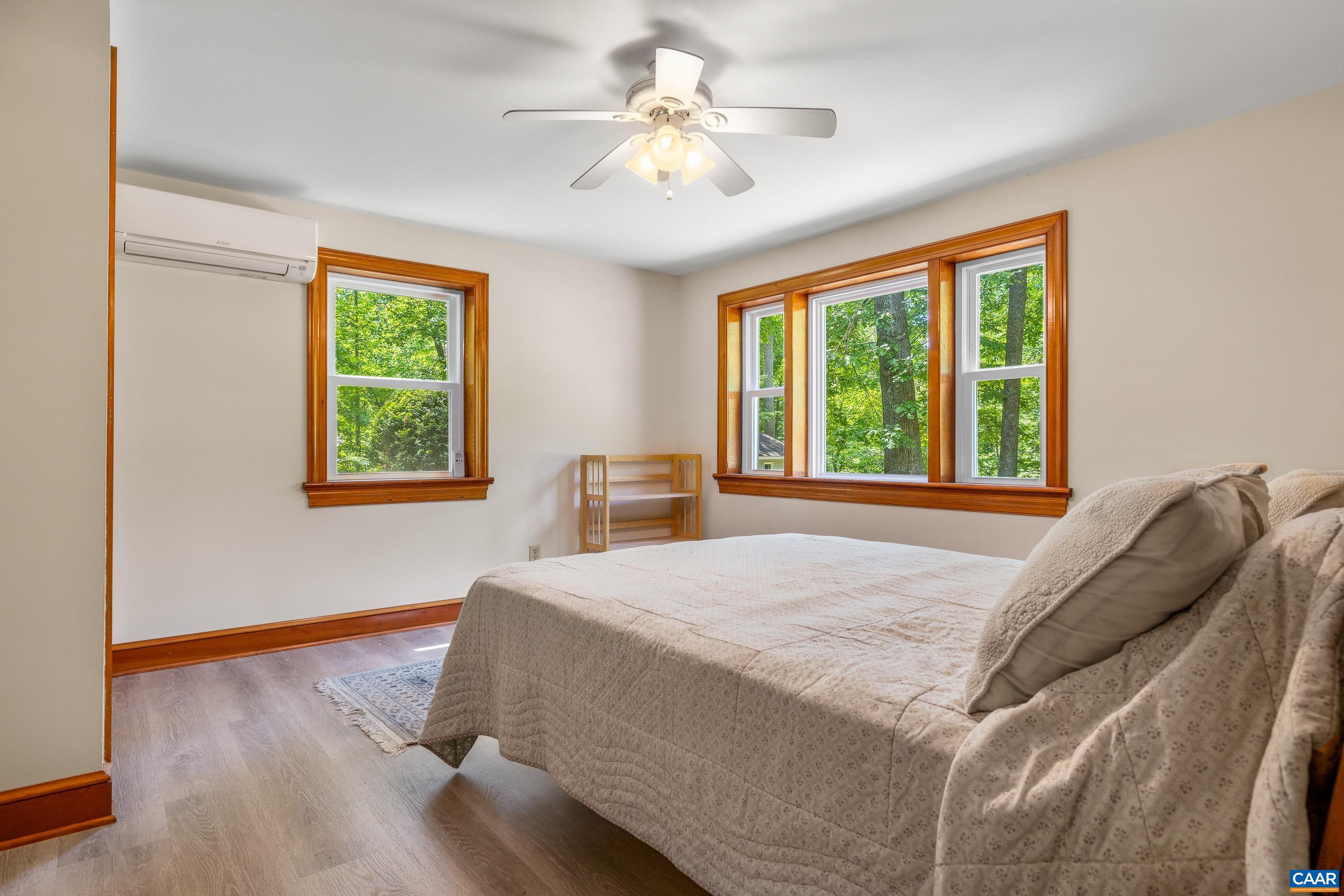 7250 Amicus Road Ruckersville, VA 22968 - Photo 57 of 74 a bedroom with a bed and a window