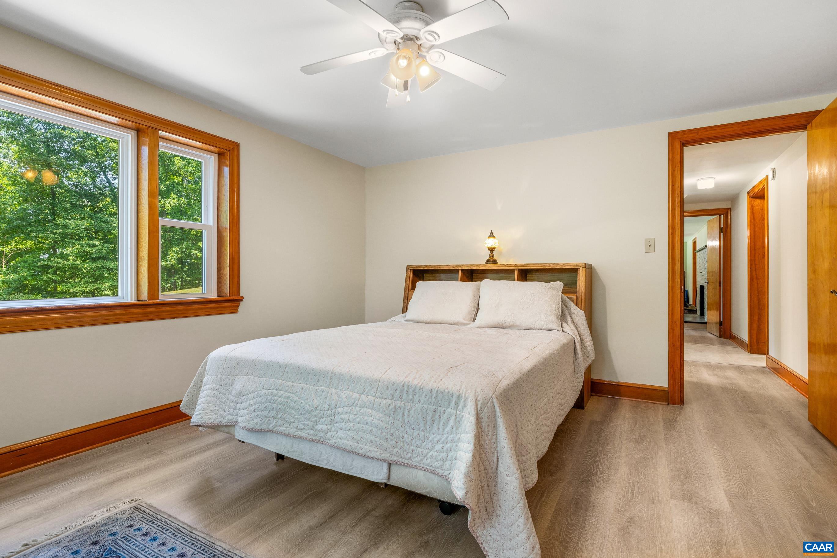 7250 Amicus Road Ruckersville, VA 22968 - Photo 58 of 74 a bedroom with a bed and window