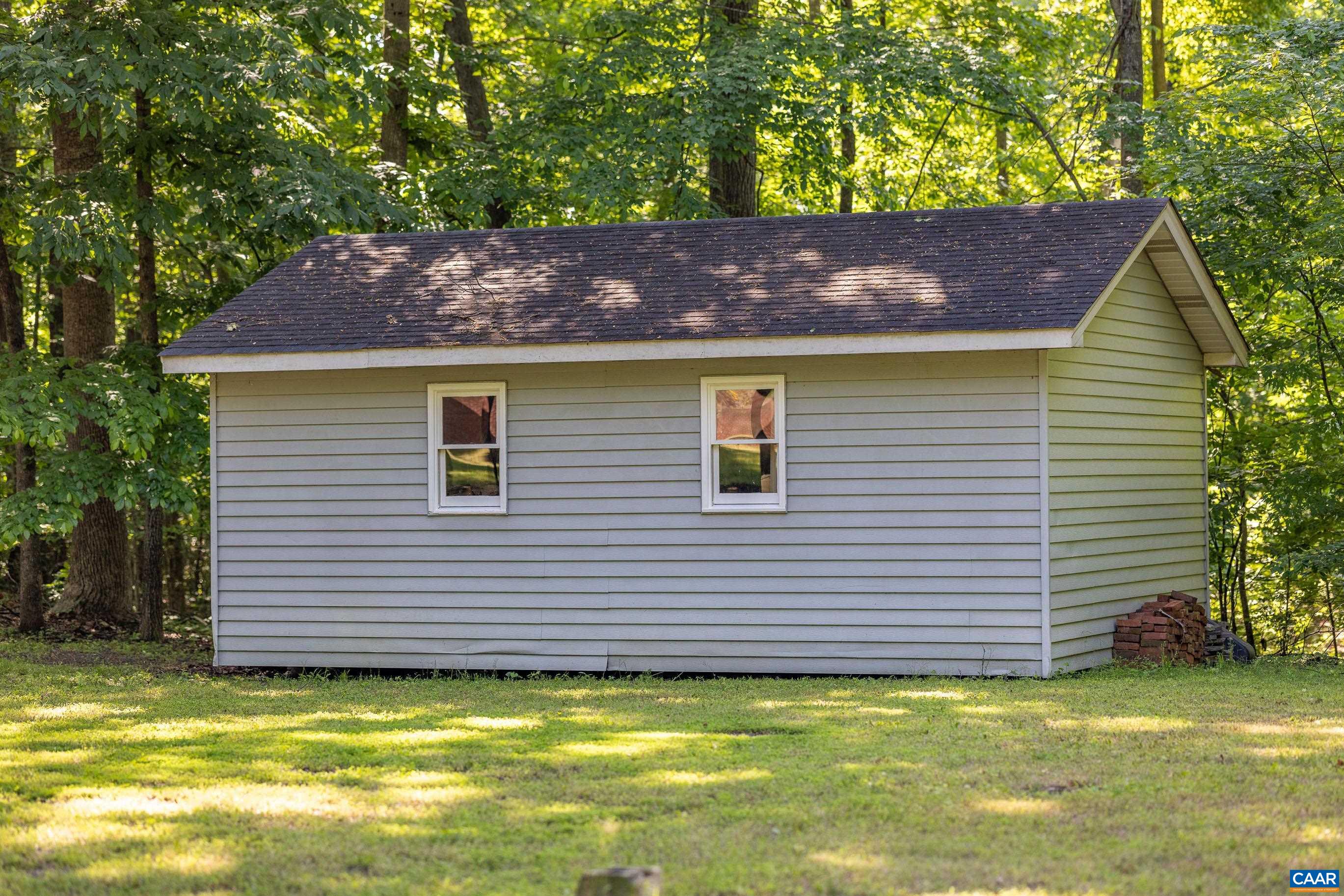 7250 Amicus Road Ruckersville, VA 22968 - Photo 66 of 74 a view of a house with a garden