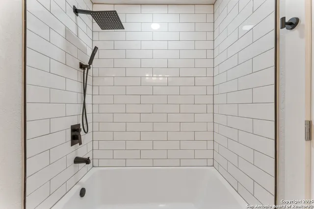 a bathroom with a bathtub