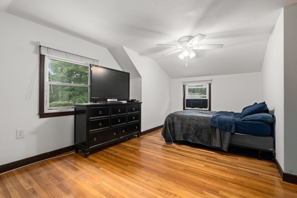 9 Laurel Lane Bellingham, MA 02019 - Photo 24 of 30 a living room with furniture and a flat screen tv
