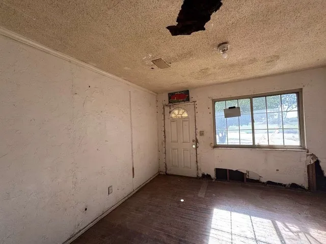 an empty room with windows