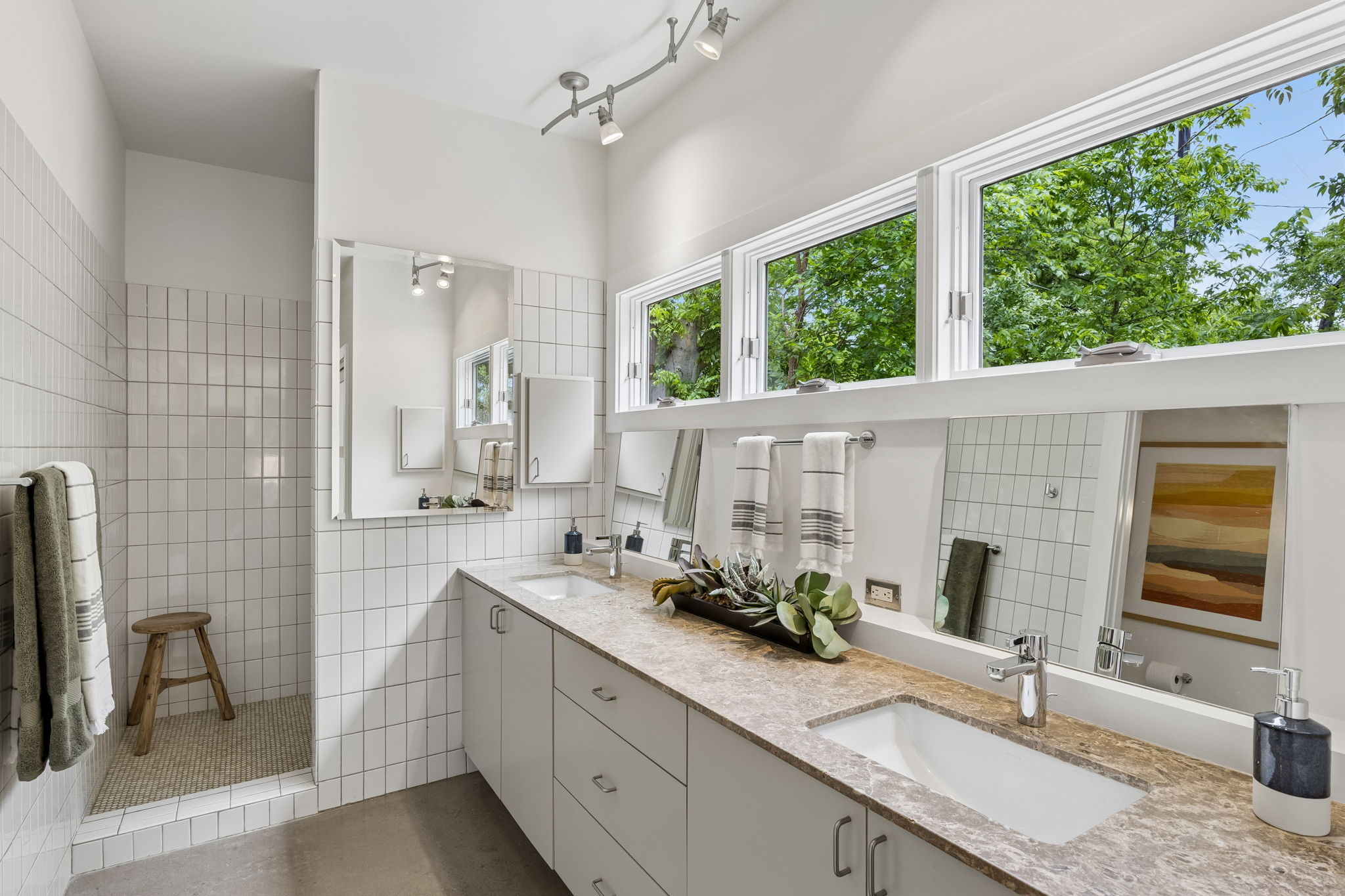 5305 Guadalupe Street, Unit A Austin, TX 78751 - Photo 13 of 31 Full bathroom featuring double vanity and tile walls