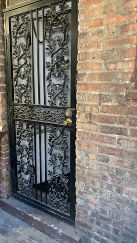 a brick building with a bench