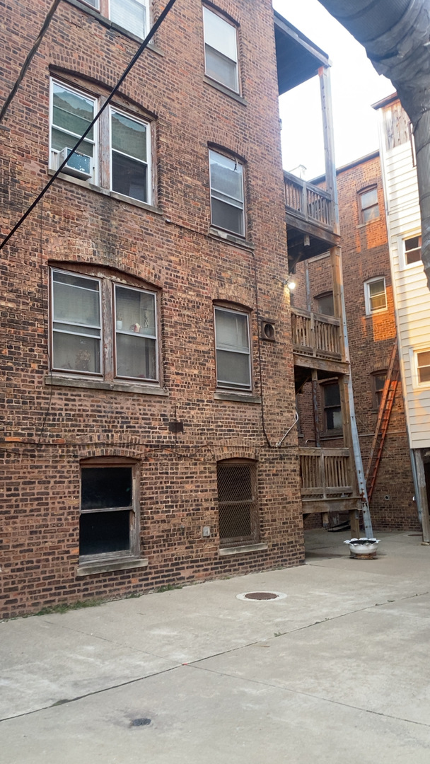 2233 East 70th Place, Unit 1 Chicago, IL 60649 - Photo 16 of 17 a front view of a building