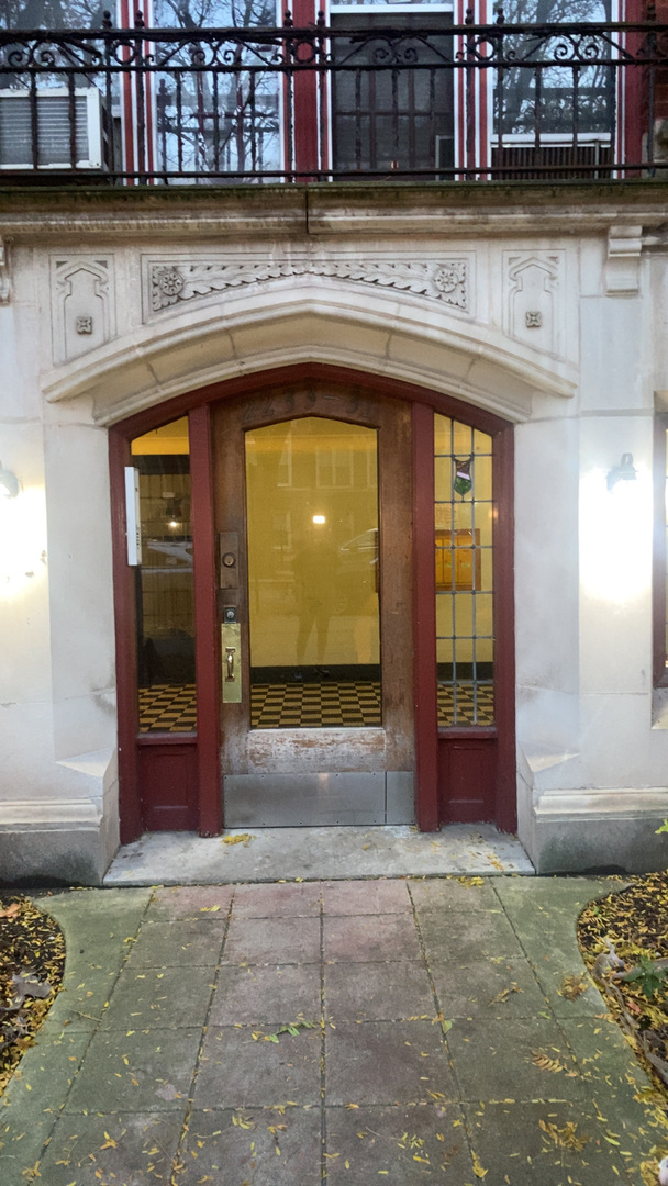 2233 East 70th Place, Unit 1 Chicago, IL 60649 - Photo 3 of 17 a view of kitchen with refrigerator and cabinets