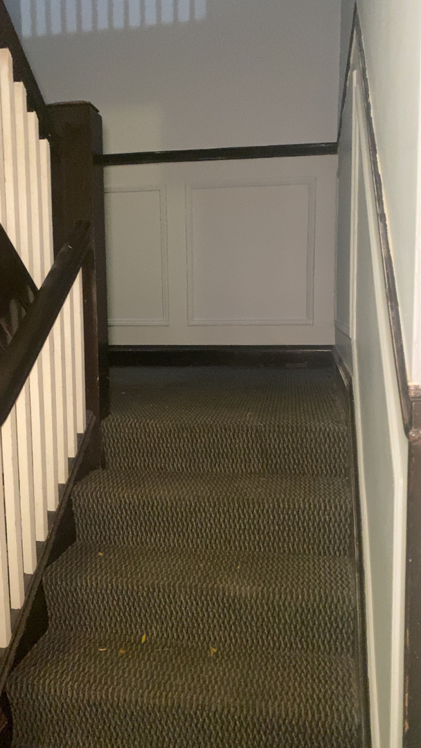 2233 East 70th Place, Unit 1 Chicago, IL 60649 - Photo 6 of 17 a view of balcony with wooden floor