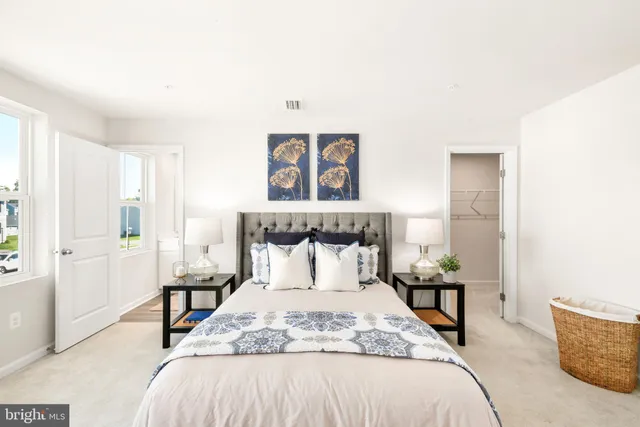 a bathroom with a sink vanity and a mirror