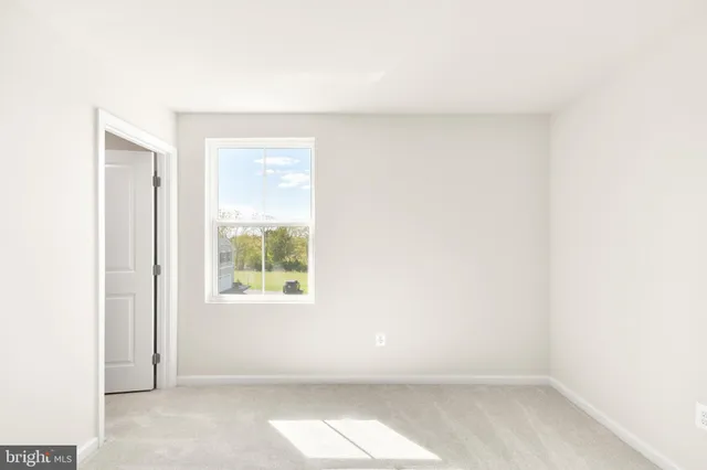 a bathroom with a sink mirror vanity and toilet