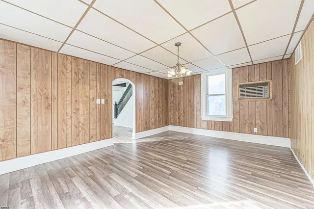 a kitchen with a stove sink and refrigerator