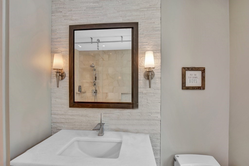 171 Scotland Road Newbury, MA 01951 - Photo 6 of 20 a bathroom with a toilet sink and mirror