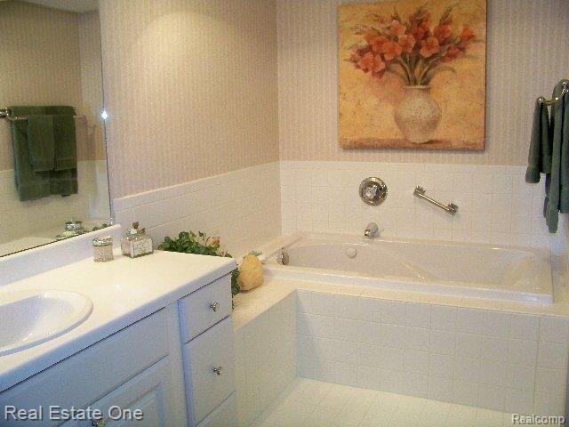 438 Lilly View Court, Unit 86 Howell, MI 48843 - Photo 23 of 25 Full Bath With Whirlpool Tub