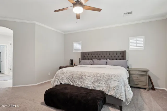 a bathroom with a double vanity sink shower and a mirror