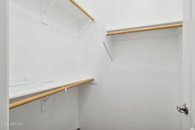 an empty room with fan