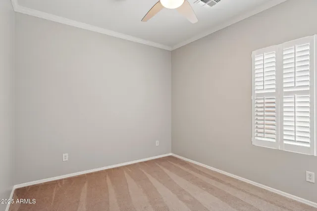 a bathroom with a double vanity sink toilet and a mirror