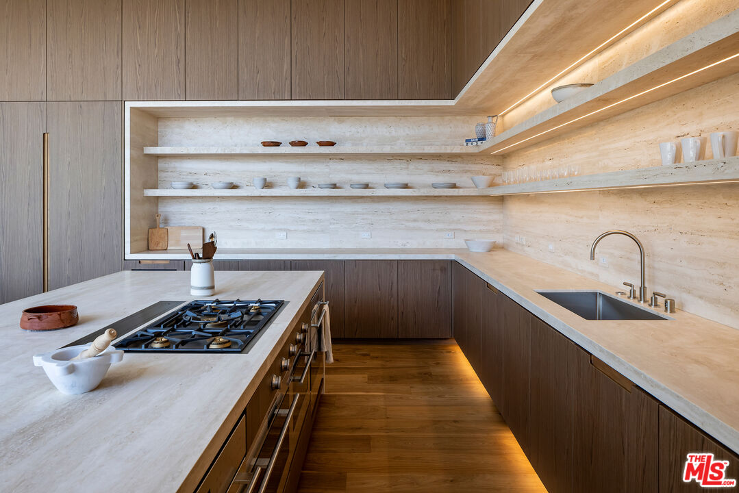755 Sarbonne Road Los Angeles, CA 90077 - Photo 8 of 24 a kitchen with a stove and a sink