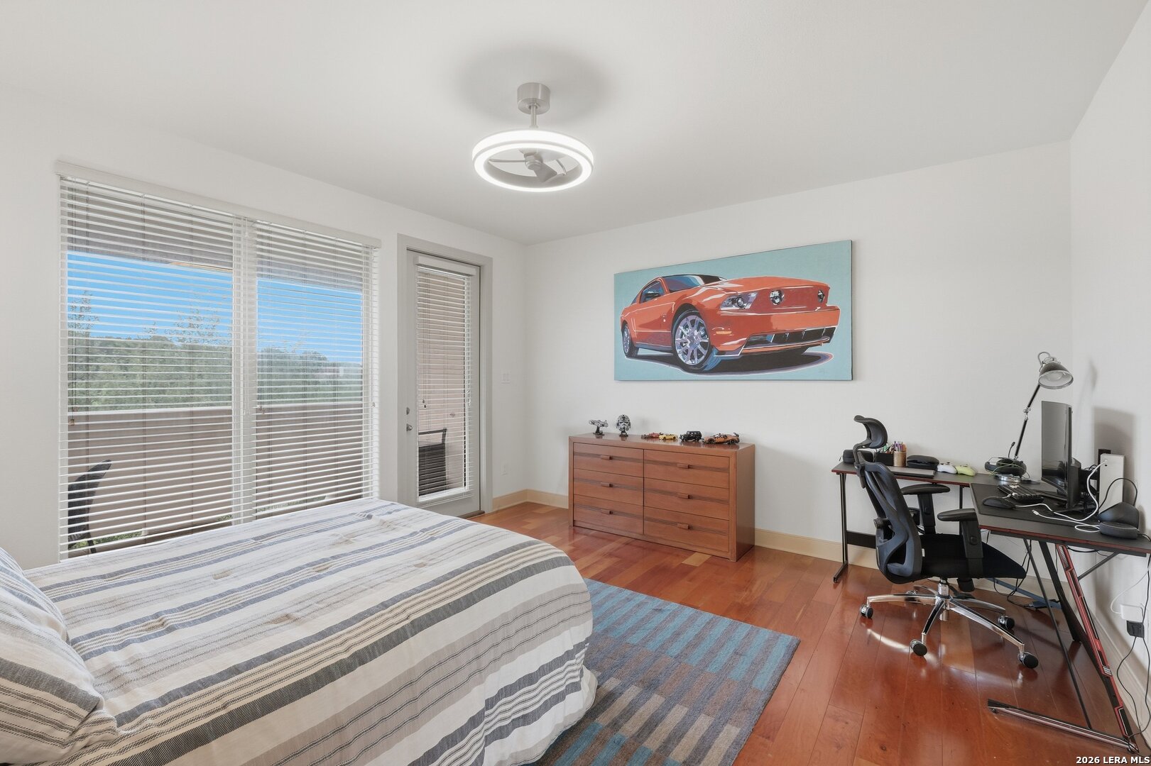 426 Legacy Ridge San Antonio, TX 78258 - Photo 26 of 38 a bedroom with furniture and a window