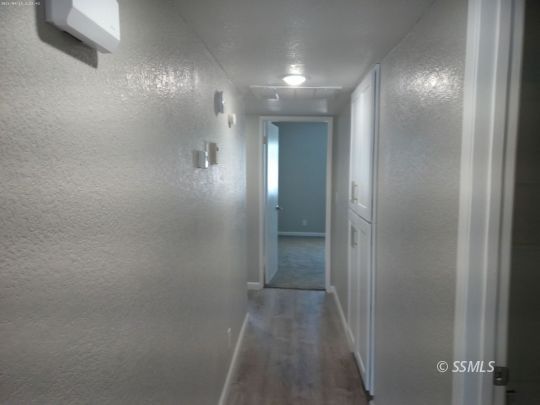 209 South Fire Opal Street Ridgecrest, CA 93555 - Photo 9 of 23 a view of a hallway