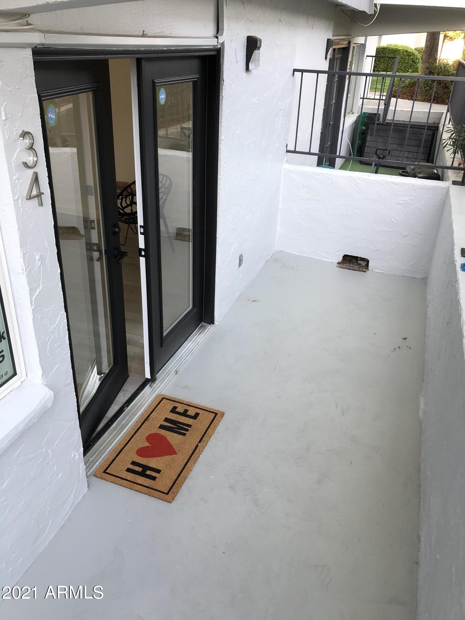 3416 North 44th Street, Unit 34 Phoenix, AZ 85018 - Photo 16 of 41 image of living room with furniture and a rug