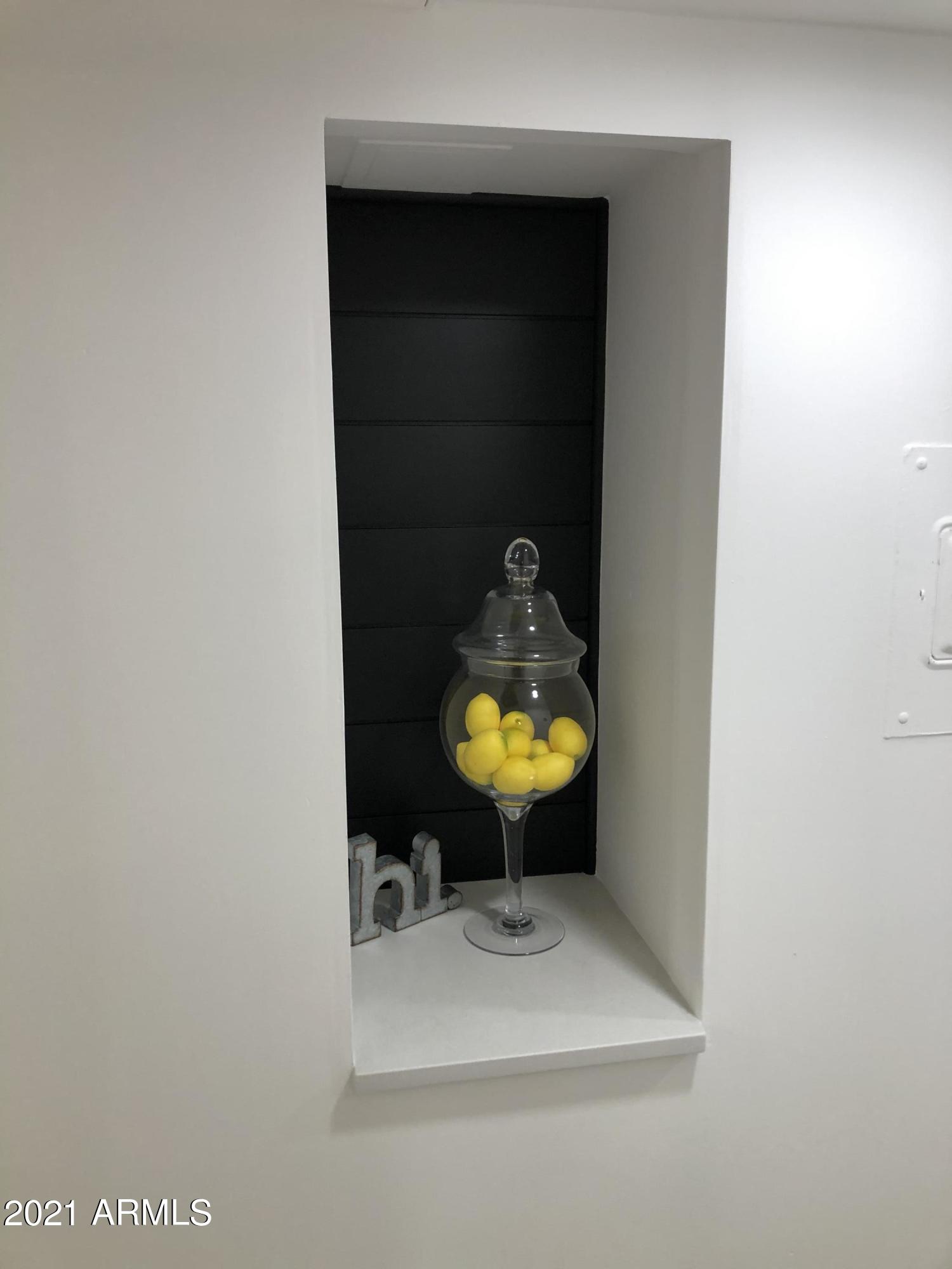 3416 North 44th Street, Unit 34 Phoenix, AZ 85018 - Photo 21 of 41 a view of living room with a table and couch