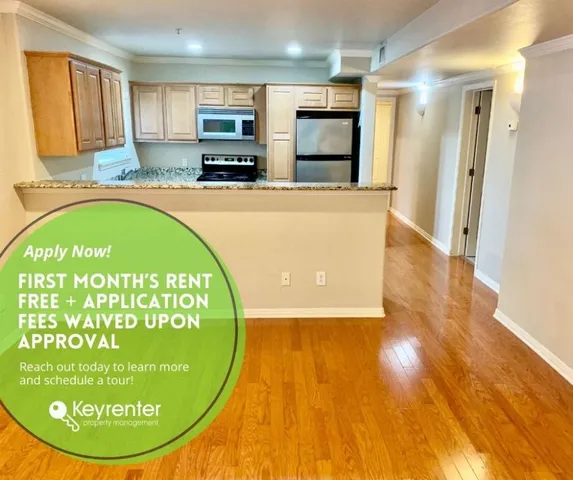 a view of kitchen cabinet and window