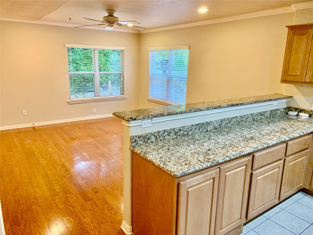 3009 Speedway, Unit 4 Austin, TX 78705 - Photo 2 of 15 a view of kitchen with granite countertop cabinets and window