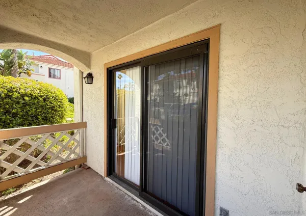 a view of an entryway with a door
