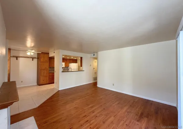a view of a livingroom with wooden floor