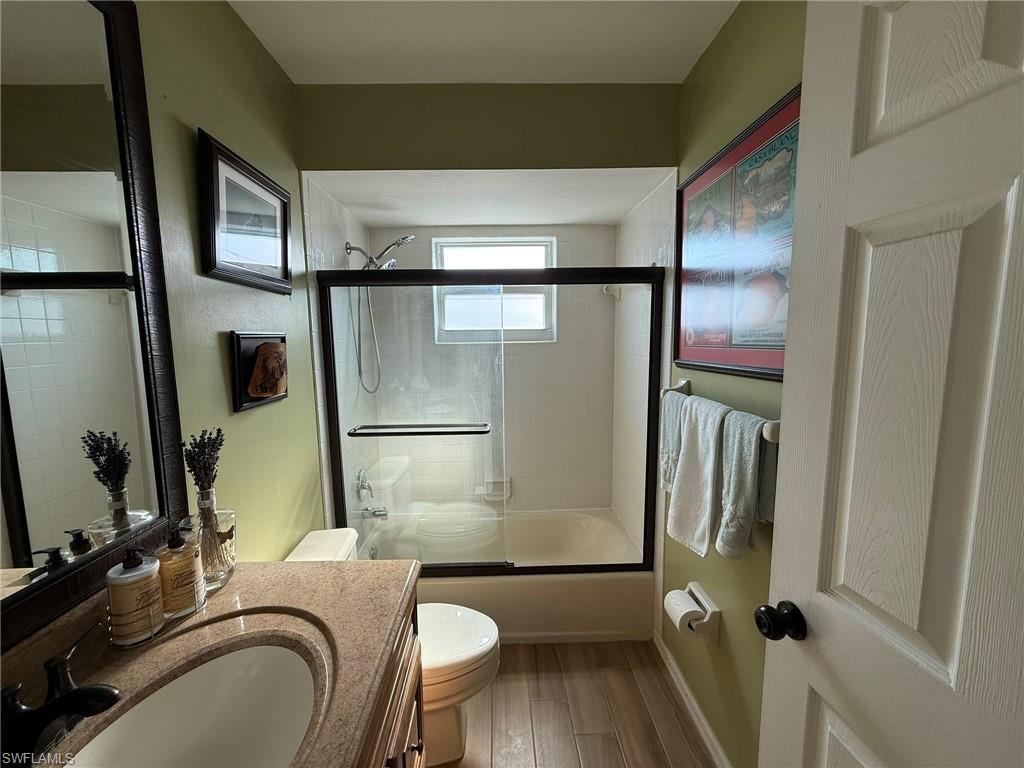 5546 Park Road Fort Myers, FL 33908 - Photo 13 of 33 a bathroom with a sink and mirror