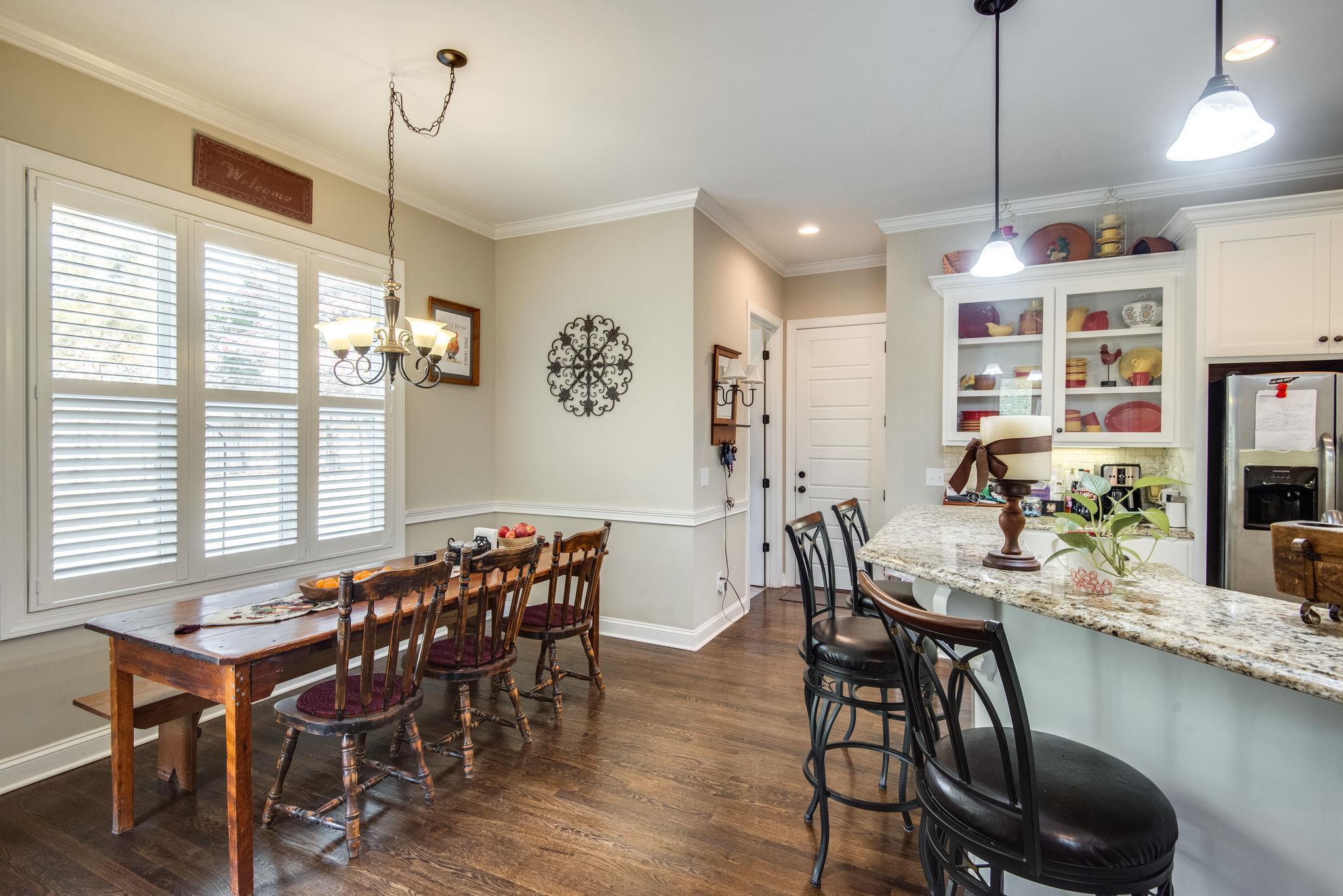 7315 Allans Ridge Lane Fairview, TN 37062 - Photo 8 of 28 Eat in area with access to side patio. Plantation shutters.
