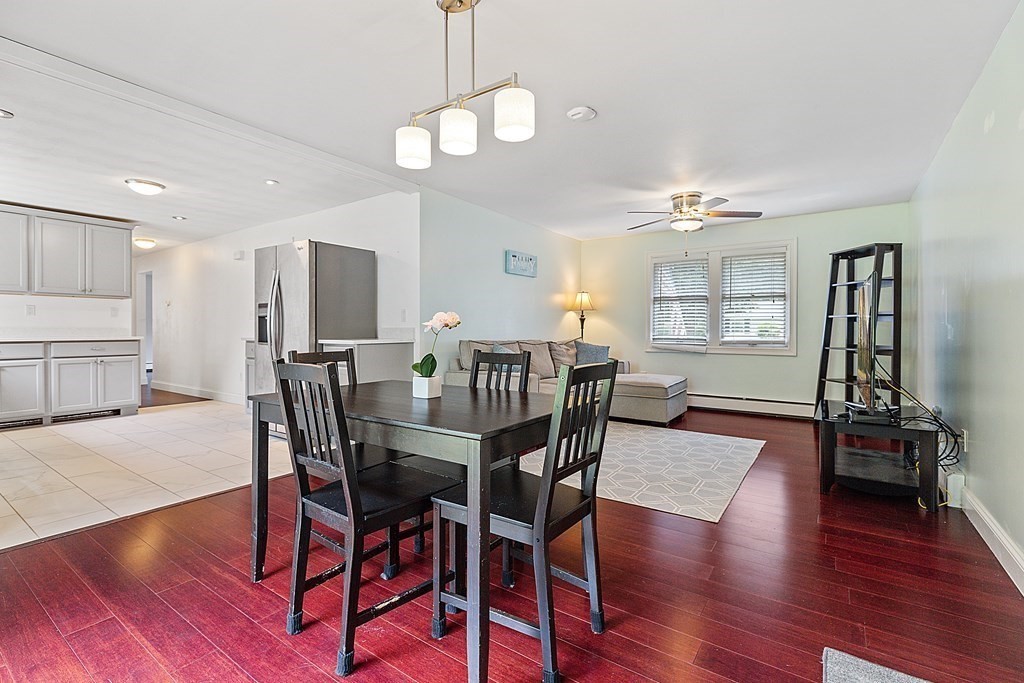 8 Winifred Road Framingham, MA 01701 - Photo 15 of 40 a view of a dining room with furniture window and wooden floor
