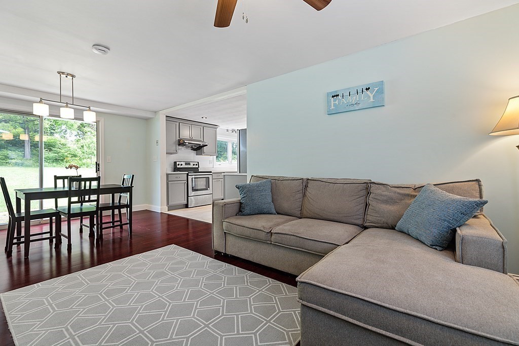 8 Winifred Road Framingham, MA 01701 - Photo 16 of 40 a living room with furniture a window and kitchen view