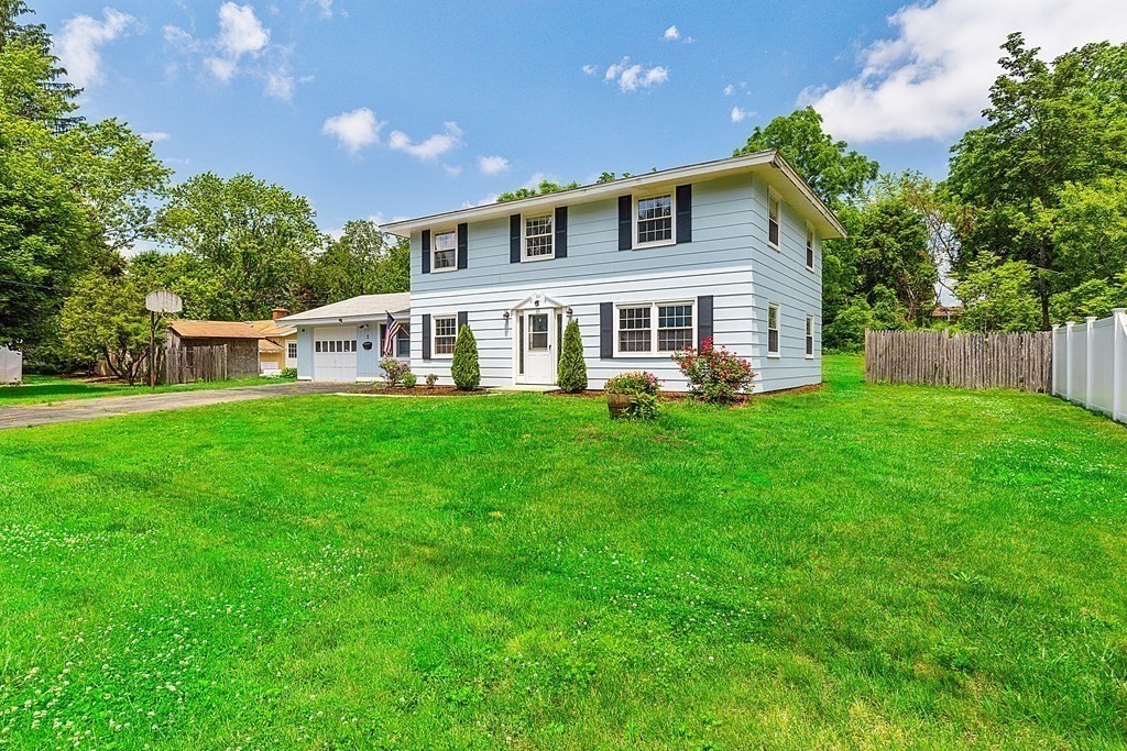 8 Winifred Road Framingham, MA 01701 - Photo 2 of 40 a view of a house with a yard and sitting area