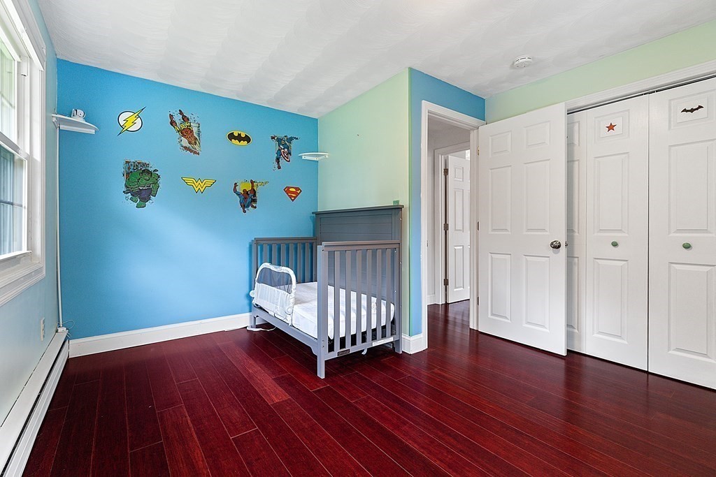 8 Winifred Road Framingham, MA 01701 - Photo 23 of 40 a view of an empty room with wooden floor