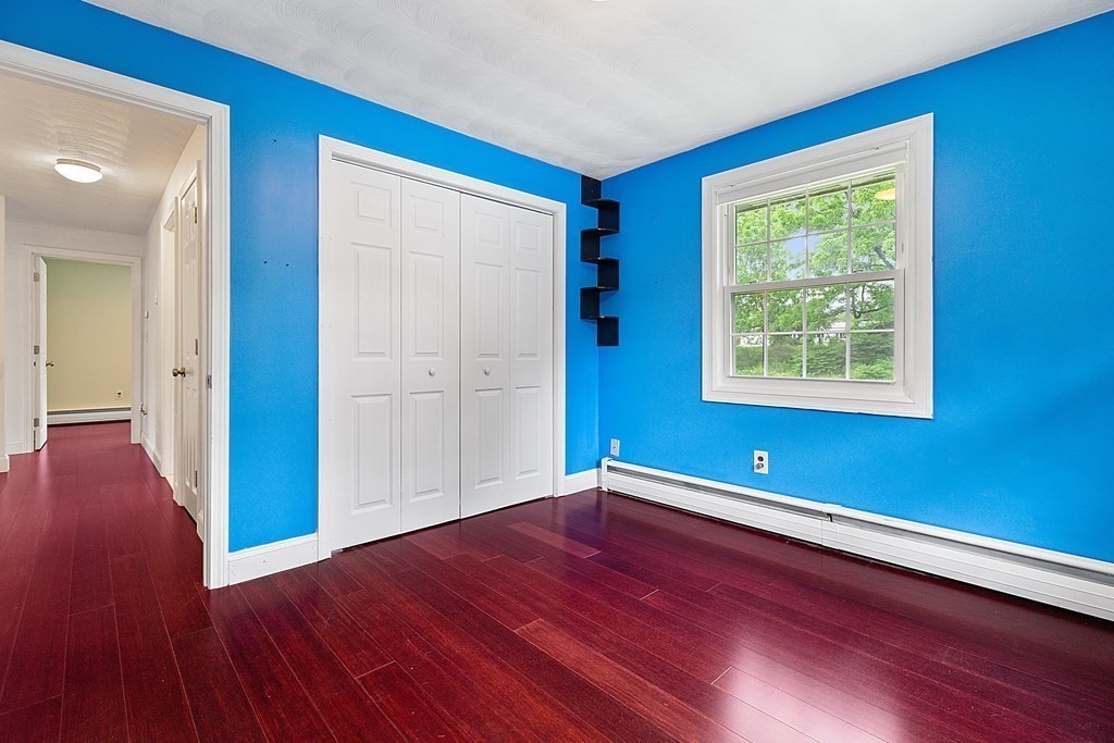 8 Winifred Road Framingham, MA 01701 - Photo 24 of 40 a view of empty room with wooden floor and fan