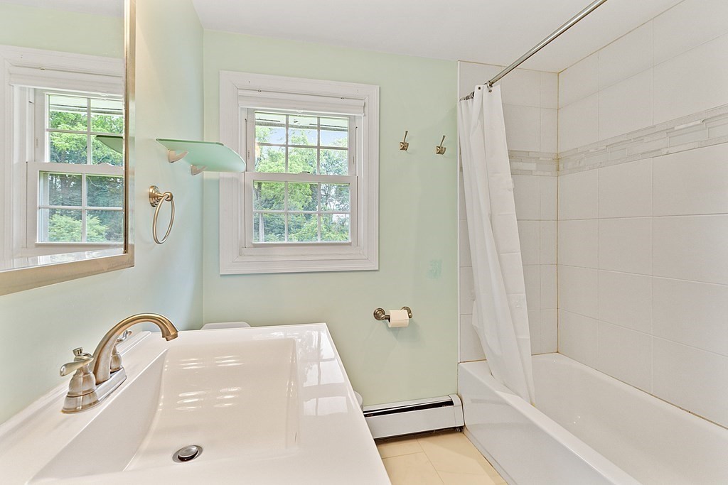 8 Winifred Road Framingham, MA 01701 - Photo 27 of 40 a bathroom with a tub sink and window