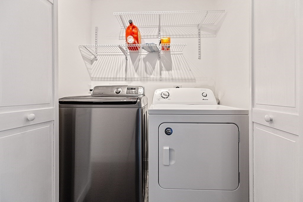 8 Winifred Road Framingham, MA 01701 - Photo 29 of 40 a utility room with dryer and washer